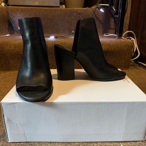 Tilt-  black booties